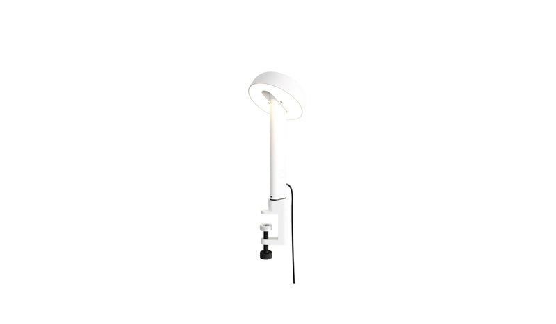 Lampe à pince blanche, Nod de Tiptoe, vue latérale avec l’ampoule allumée, abat-jour circulaire.