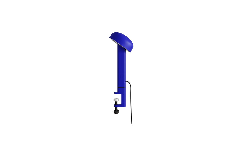 Lampe à pince bleue, Nod de Tiptoe, vue latérale, avec un bras fin et un abat-jour circulaire.