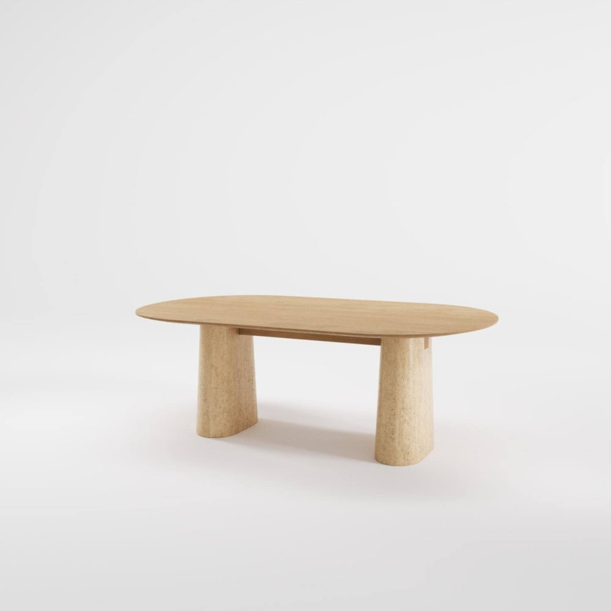 Table Anchor 200 cm en chêne et travertin massif, vue en angle sur fond blanc.