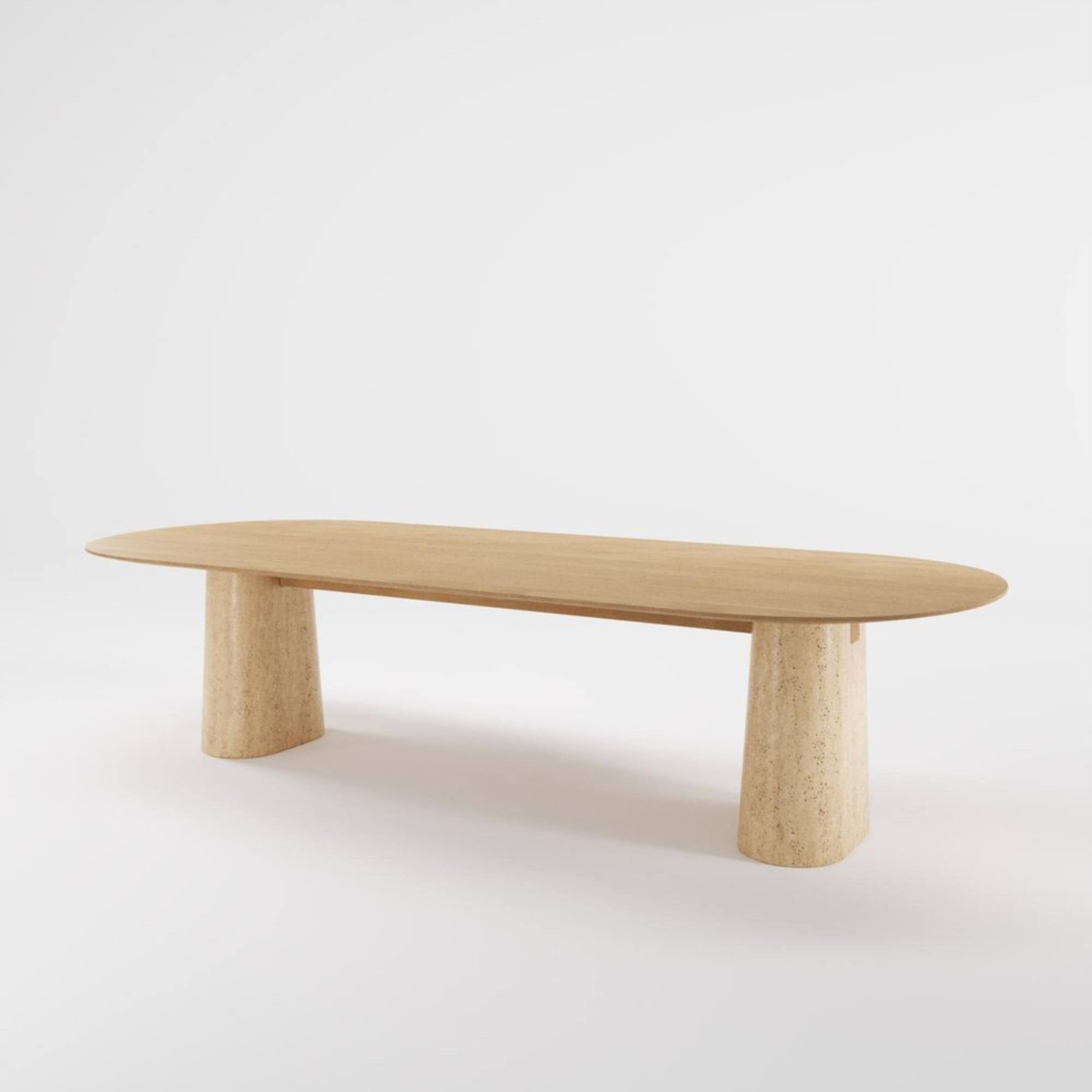 Table Anchor 300 cm en chêne et travertin massif, vue en angle sur fond blanc.