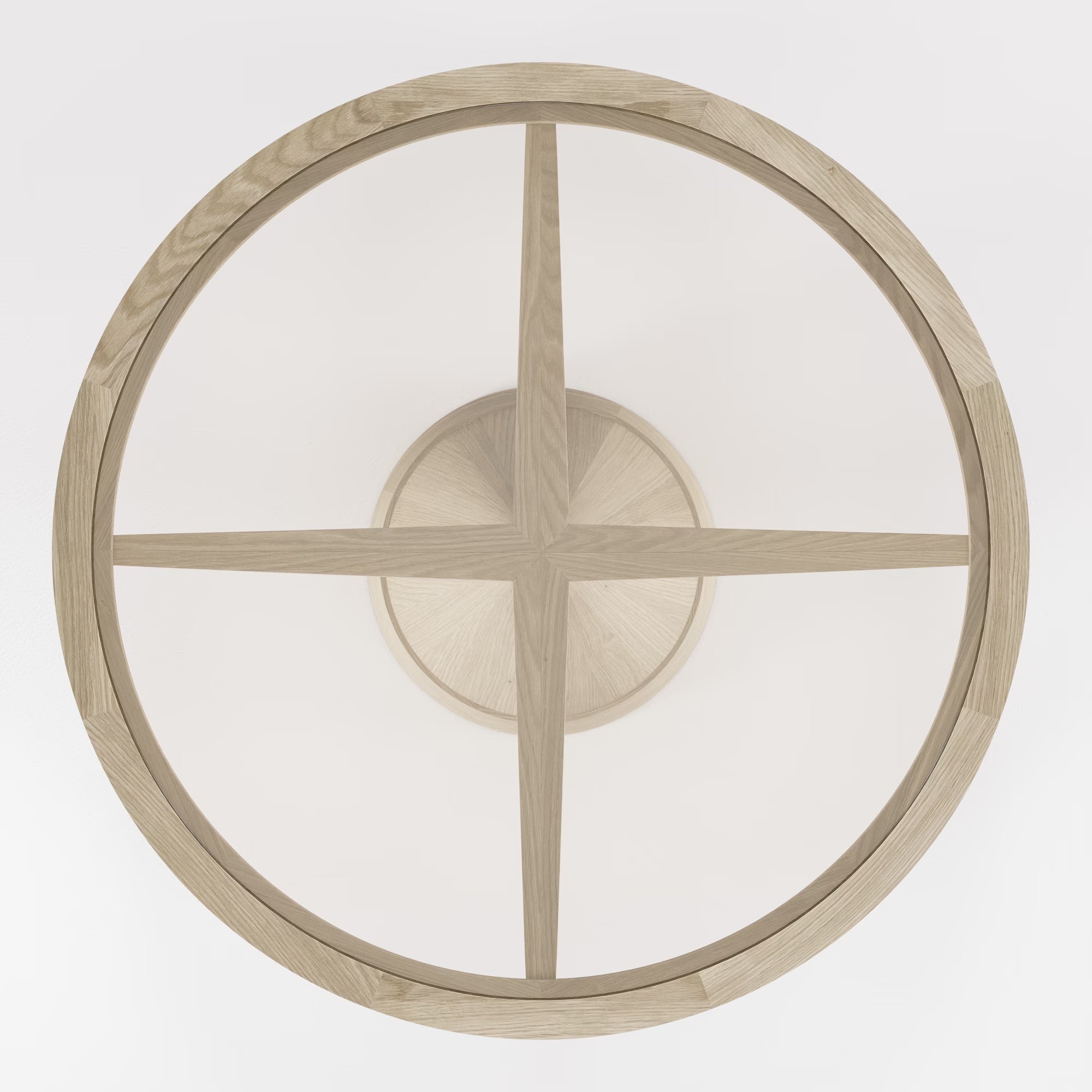 Table ronde Vasco en chêne clair et verre transparent, vue du dessus sur fond blanc, structure en croix apparente