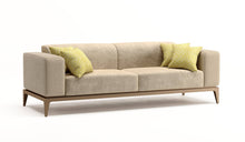 Exceptional Leda sofa, in fabric, alcantara and wood