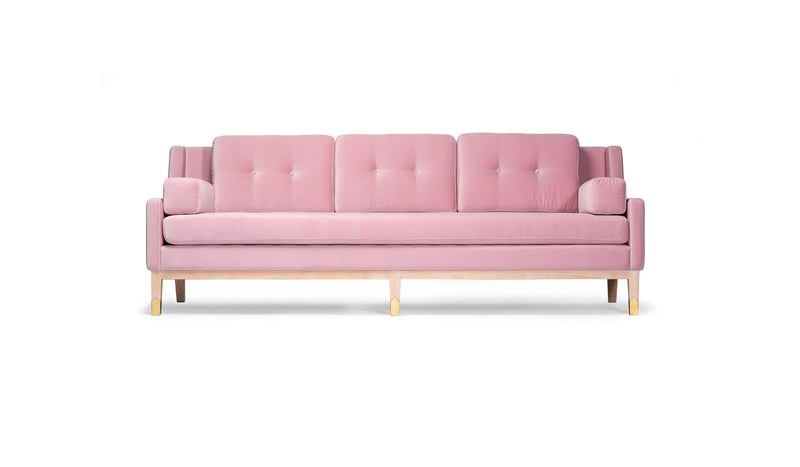 Mr. Jones upholstered sofa, in exceptional fabric, pink, whitewashed oak and brass