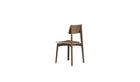 Chaise Ericeira de Wewood en noyer massif, vue arrière trois quarts gauche, dossier cintré et assise incurvée, fond blanc.