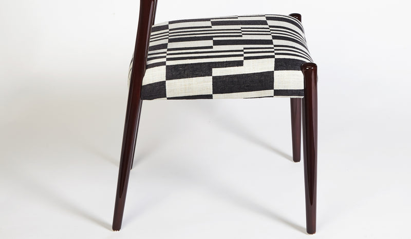 Bossa high-end dining chair in lacquered wood and fabric