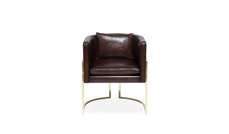 Comfortable Julius dining chair, brass structure and leather covering