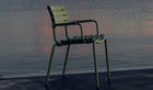 Reclips - Outdoor chair in aluminum and recycled plastic with armrests, olive green