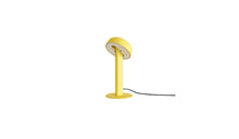 Lampe de table Nod en métal jaune, base ronde et tête inclinée, éteinte