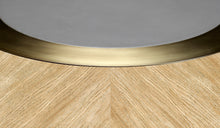 Lune round dining table, in whitewashed oak, bronze and leather details