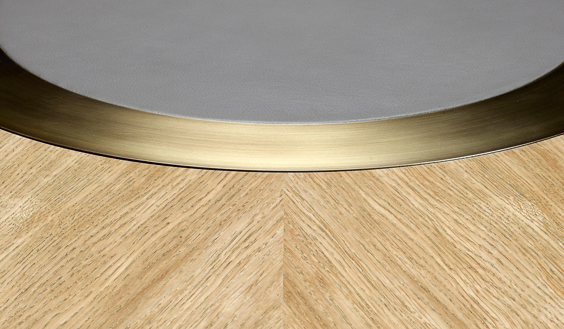 Lune - Dining table in limed oak, bronze and leather details