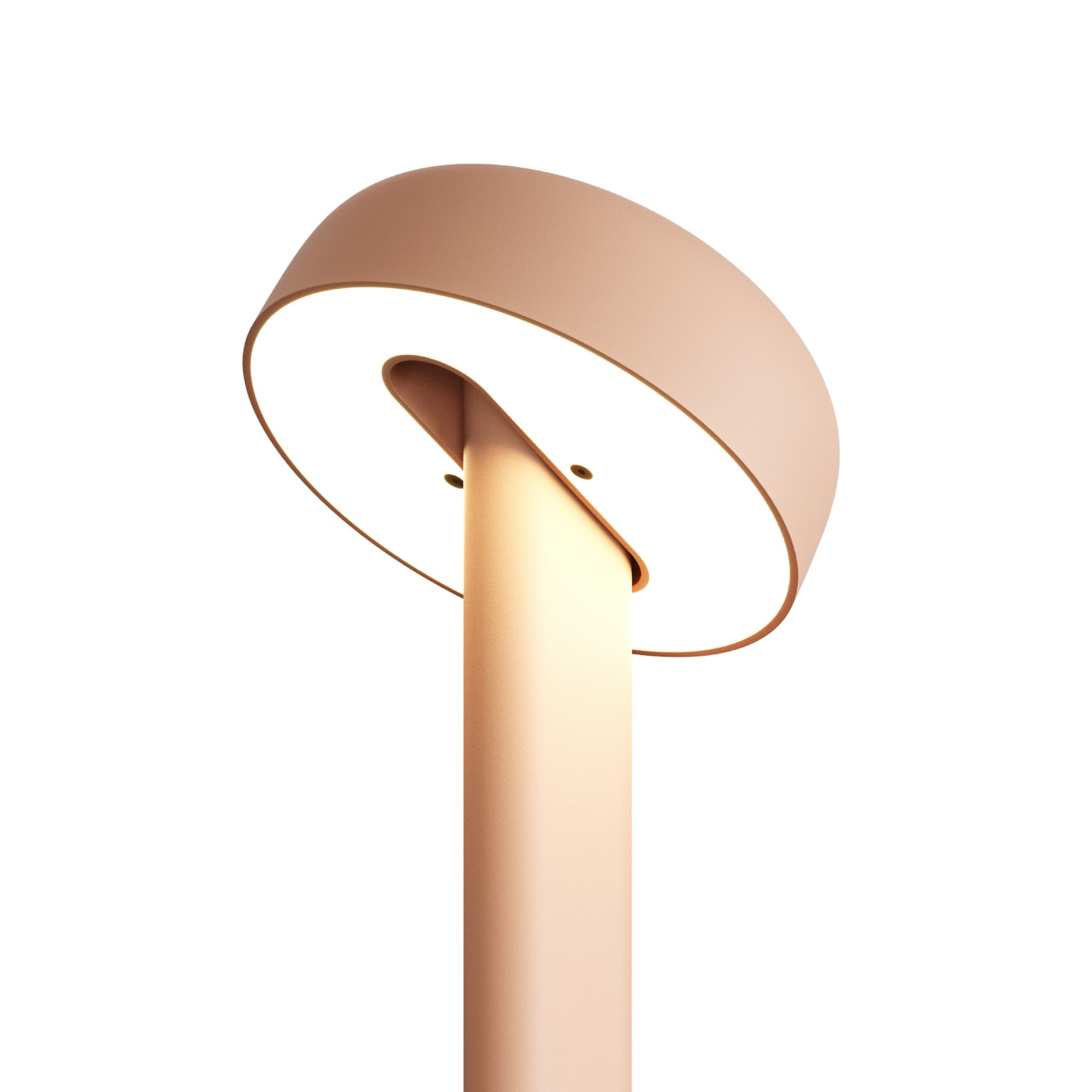 Lampe rose, modèle Nod de Tiptoe, vue rapprochée de l’abat-jour circulaire, éclairage visible, avec la lumière dirigée vers le bas.