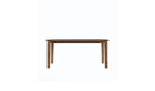 Vue de face de la table Soma 180 cm en noyer massif, piètement large et structure visible, 6 à 8 places, sur fond blanc