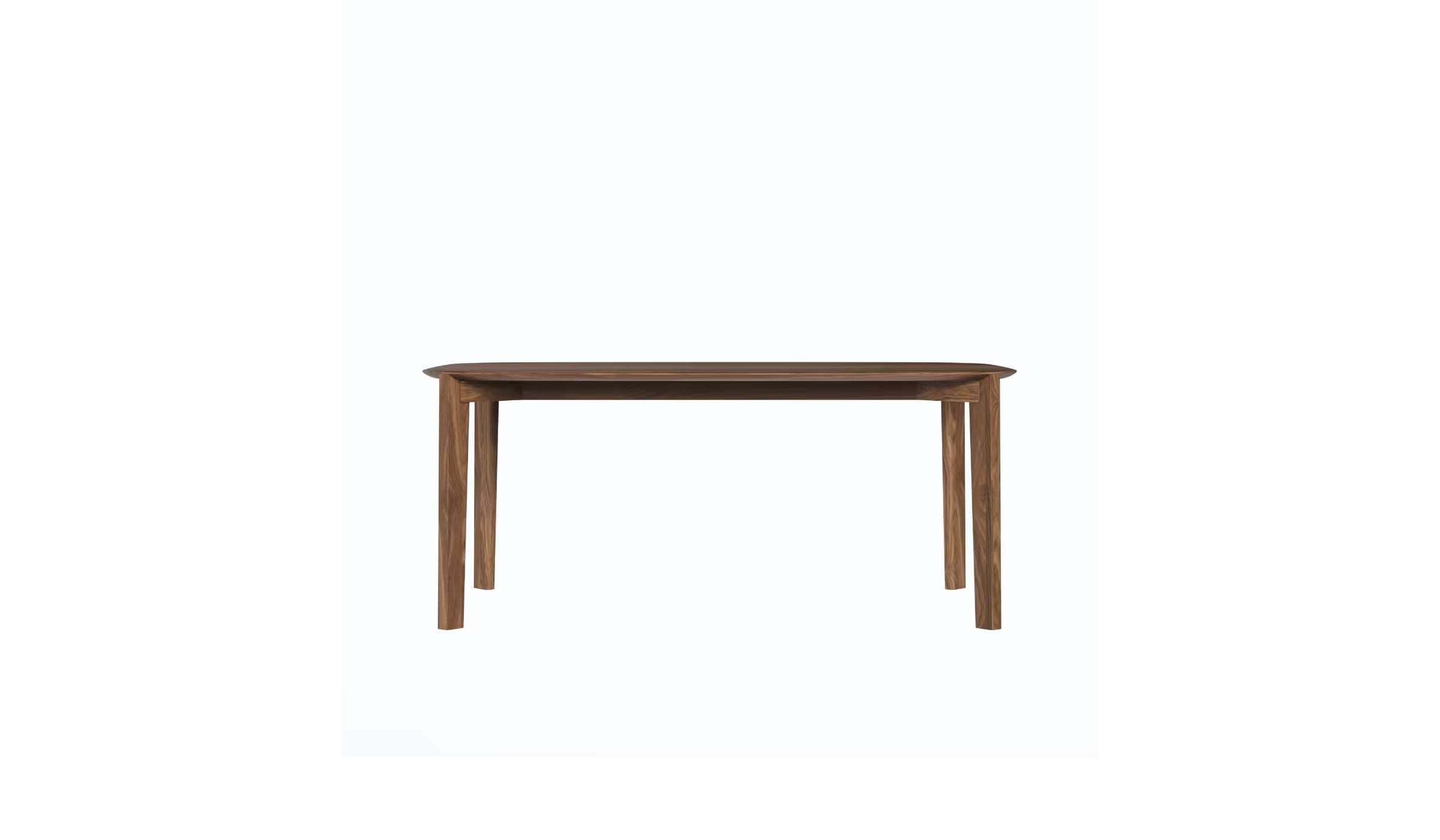Vue de face de la table Soma 180 cm en noyer massif, piètement large et structure visible, 6 à 8 places, sur fond blanc