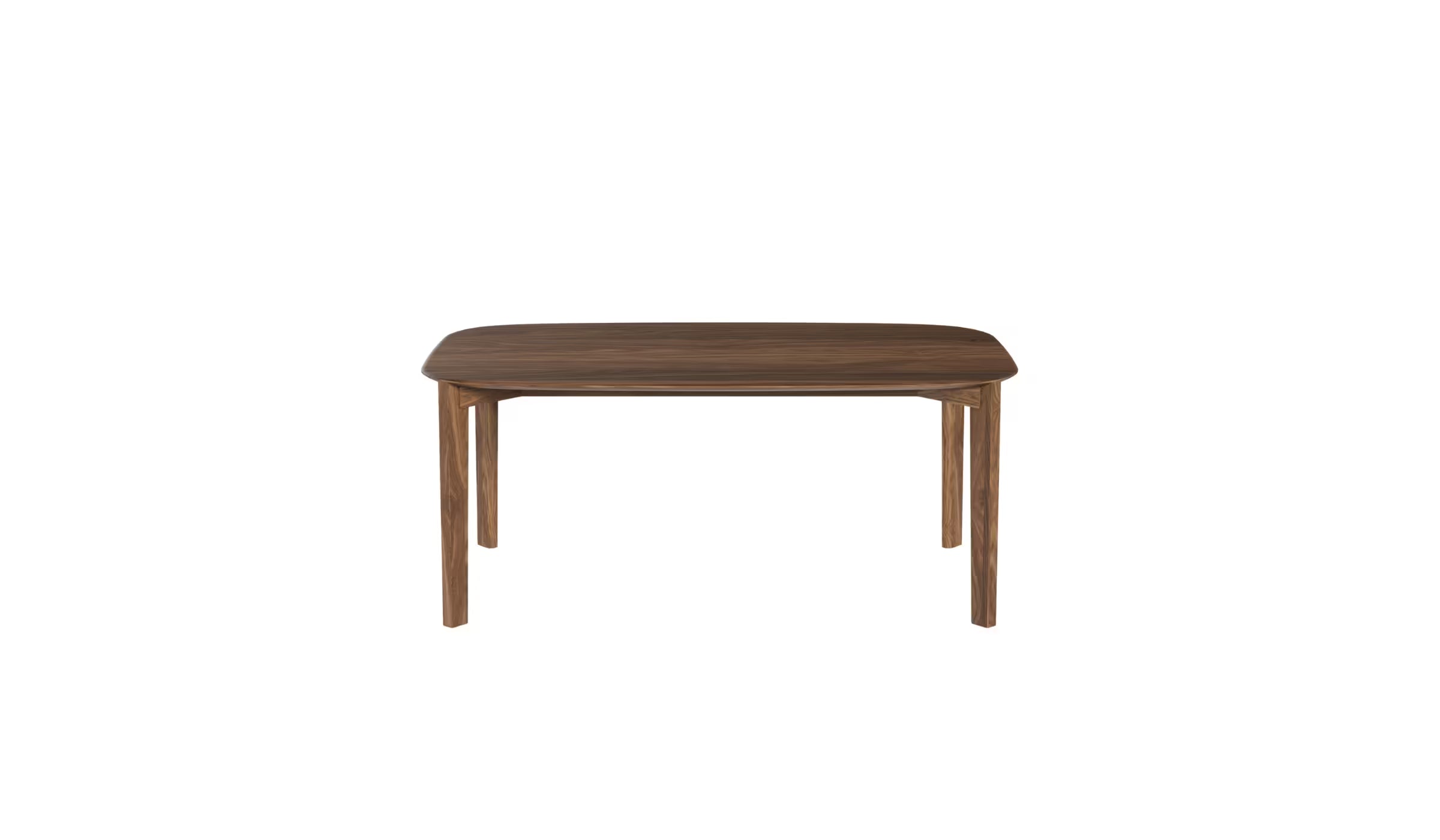 Vue en légère plongée de la table Soma 180 cm en chêne noyer, plateau ovale et structure fine, 6 à 8 places sur fond blanc