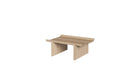Table basse Rigoles de WeWood en chêne naturel, design organique avec plateau sculpté, vue de trois quarts sur fond blanc