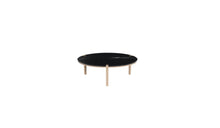 Table basse ronde Corner, en marbre Nero Marquina