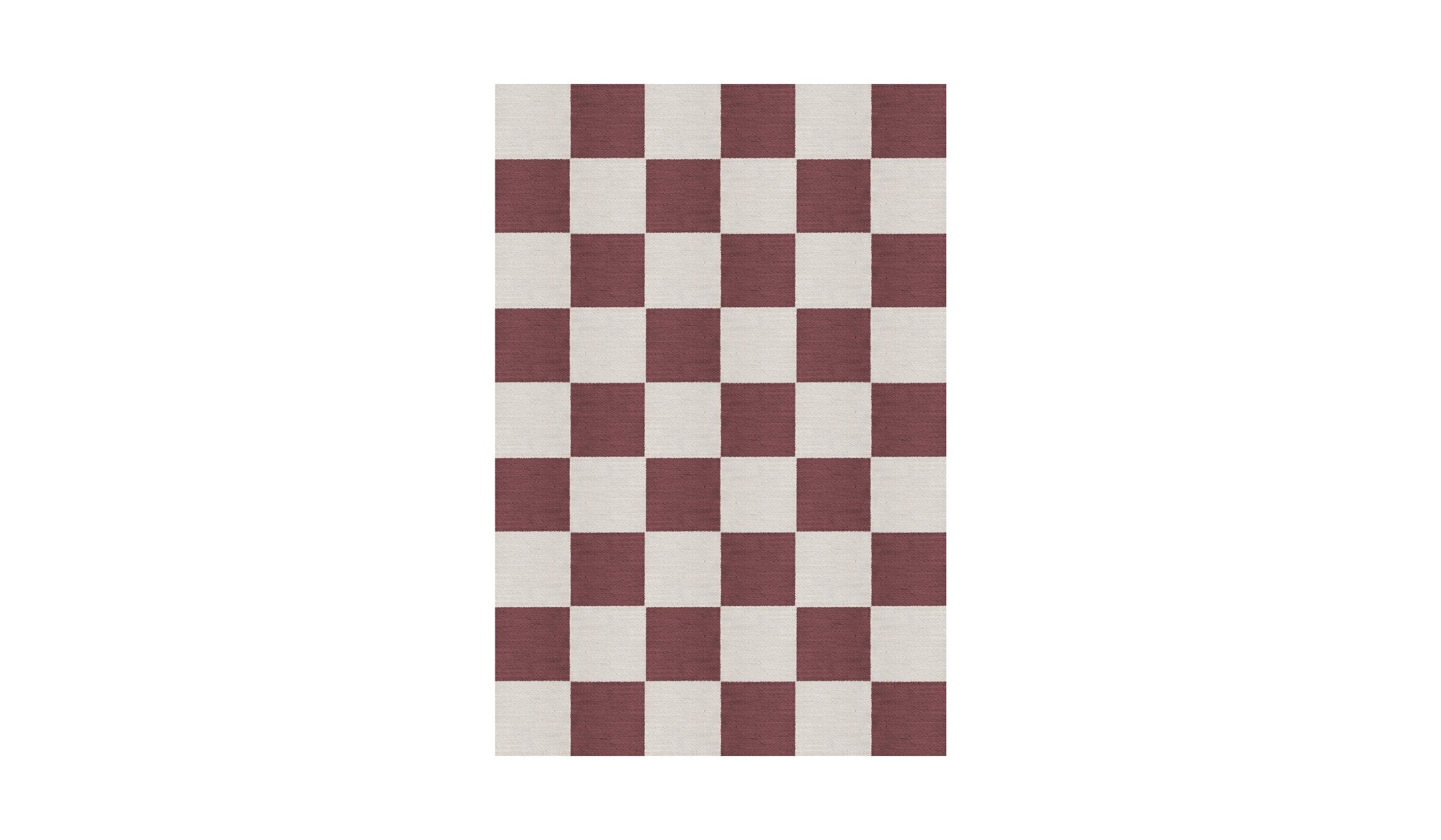 Red and white checkered Chess rug in natural wool