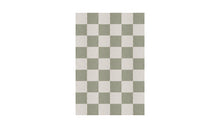 Green and white checkered Chess rug in natural wool