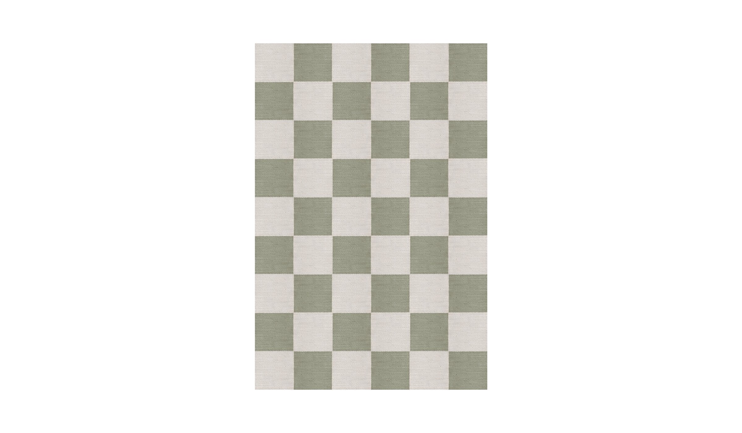 Green and white checkered Chess rug in natural wool