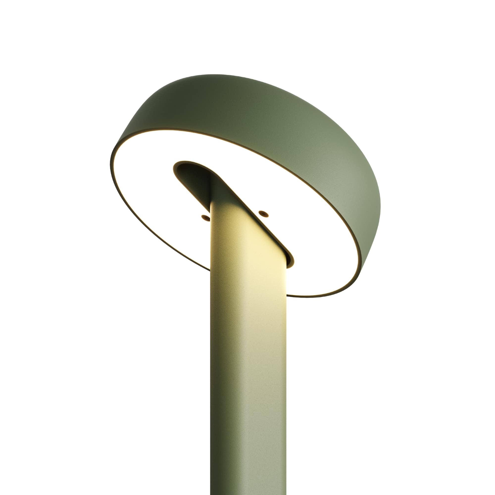 Lampe verte, modèle Nod de Tiptoe, vue rapprochée de l’abat-jour circulaire, éclairage visible, avec la lumière dirigée vers le bas.